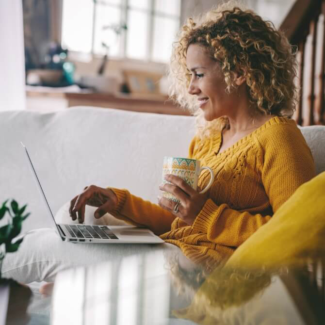Image showing a women looking on her laptop